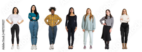 Feminism, women's rights. Set of different, multi ethnic people, young women standing isolated over white background, Horizontal flyer, banner.