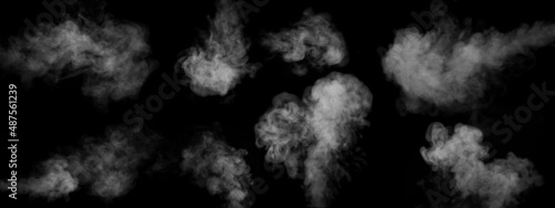 A set of eight different types of swirling, writhing smoke, steam isolated on a black background for overlaying on your photos photo