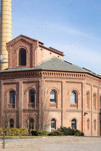 Old gasworks building, red brick architecture in the city, Poznan, Poland