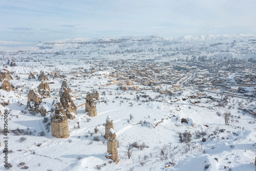 Pigeon Valley and Cave town in Goreme during winter time. Cappadocia, Turkey. Open air museum, Goreme national park. Heavenly landscape Pigeon Valley and Cave town in Goreme during winter time. Cappadocia, Turkey. Open air museum, Goreme national park. Heavenly landscape