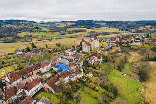 Aerial view of Curemonte in France, with old castles and the historic town buildings in the village photo