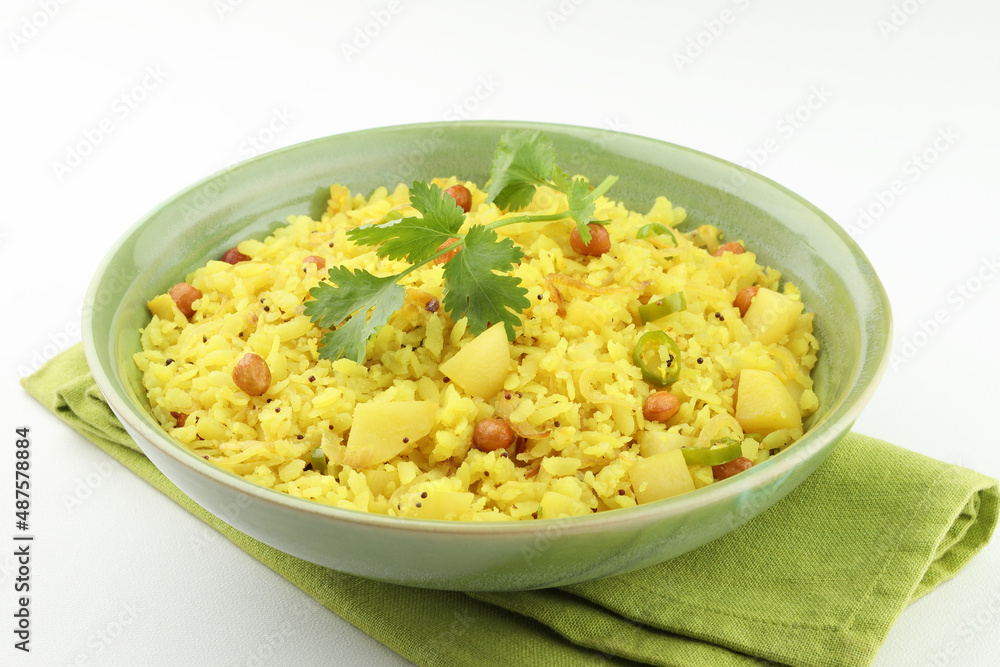 indian breakfast dish poha Aloo/Kanda Poha or Tarri Pohe with spicy chana masala/curry indian breakfast dish poha Aloo/Kanda Poha or Tarri Pohe with spicy chana masala/curry