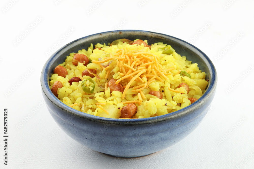 indian breakfast dish poha Aloo/Kanda Poha or Tarri Pohe with spicy chana masala/curry indian breakfast dish poha Aloo/Kanda Poha or Tarri Pohe with spicy chana masala/curry