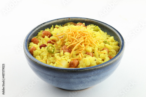 indian breakfast dish poha Aloo/Kanda Poha or Tarri Pohe with spicy chana masala/curry