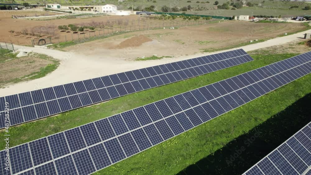 Fly over solar panels, Solar power plant in Lagos Portugal. Renewable