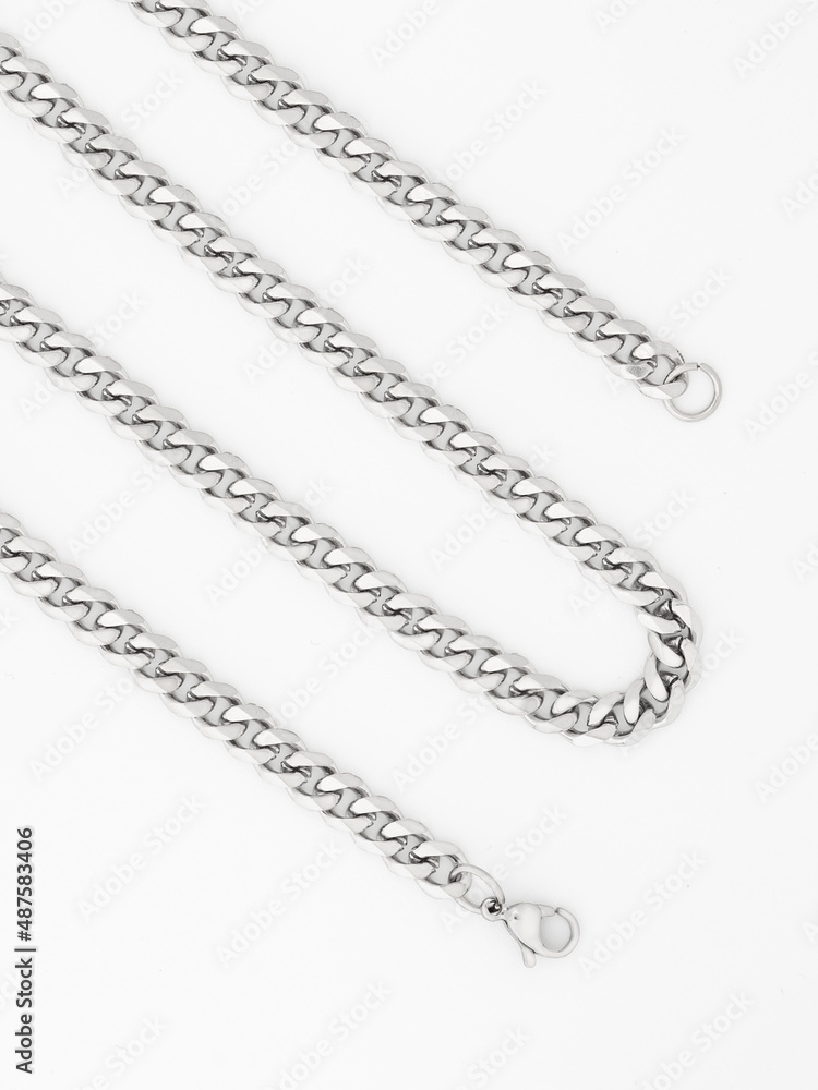 Men's silver chain on a white background with standard links Men's silver chain on a white background with standard links