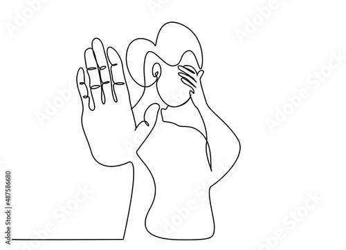 An anxious stressed woman making a stop sign. woman closing her eyes making a stop sign.