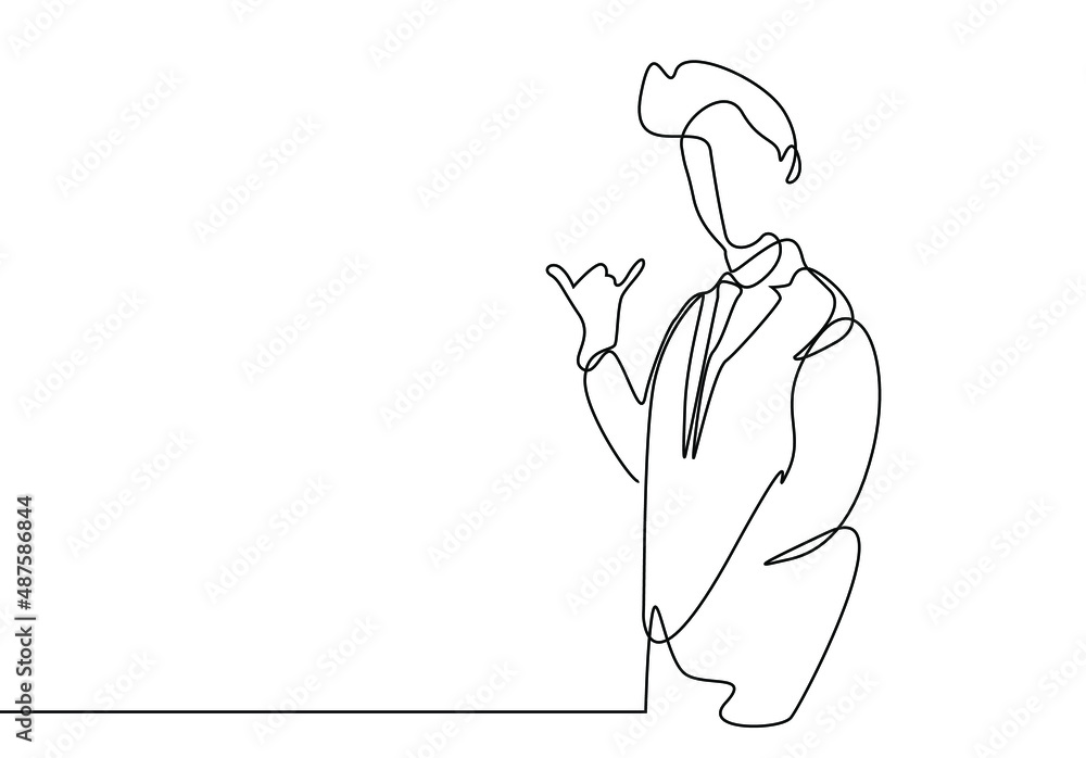 a businessman is making a phone call sign with his fingers a businessman is making a phone call sign with his fingers