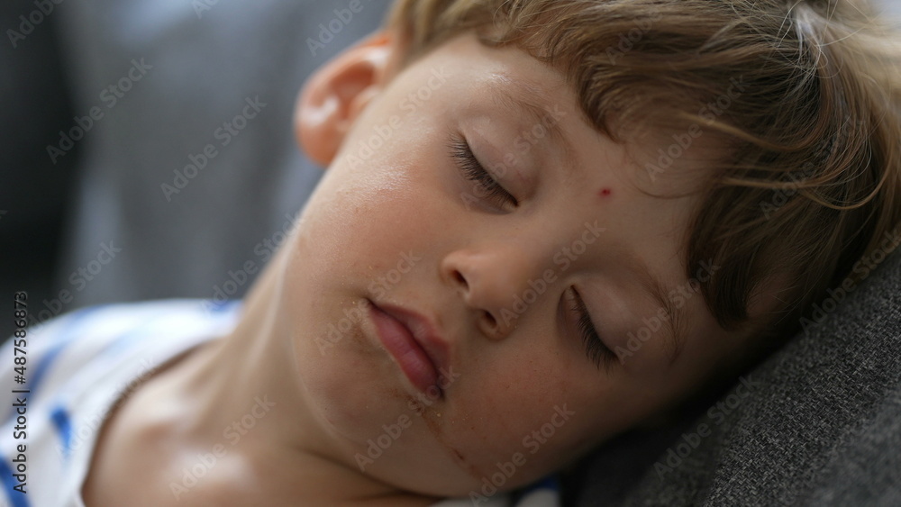 Little boy asleep child napping close-up face toddler boy resting Little boy asleep child napping close-up face toddler boy resting