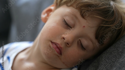 Little boy asleep child napping close-up face toddler boy resting
