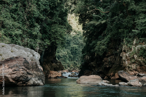 View of the river flowing through the rocky cliffs. Beautiful view of Kaeng Nam Wa, Wa River, Mae Charim District, Nan Province, Thailand