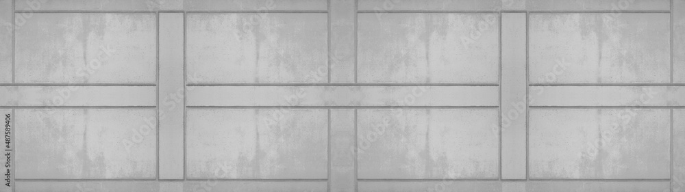 White gray grey stone concrete cement wall facade from a building texture background panorama banner White gray grey stone concrete cement wall facade from a building texture background panorama banner