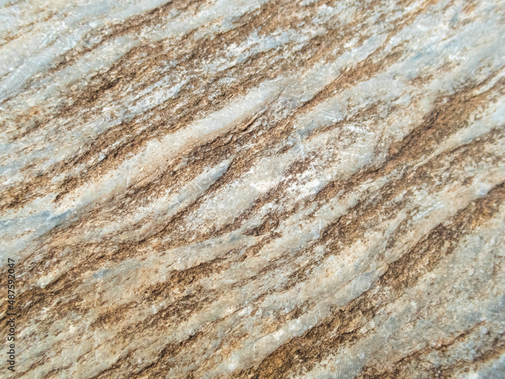 selective focus on rocks close up Beautiful pattern, looks strong. gray stone background with brown pattern caused by soil rock in nature selective focus on rocks close up Beautiful pattern, looks strong. gray stone background with brown pattern caused by soil rock in nature
