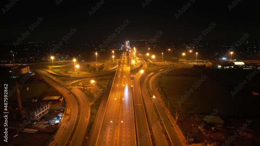 4K : Aerial Hyperlapse drone view of highway multi-level junction road. Timelapse of Direct view from elevated express road in urban area
4K : Aerial Hyperlapse drone view of highway multi-level junction road. Timelapse of Direct view from elevated express road in urban area