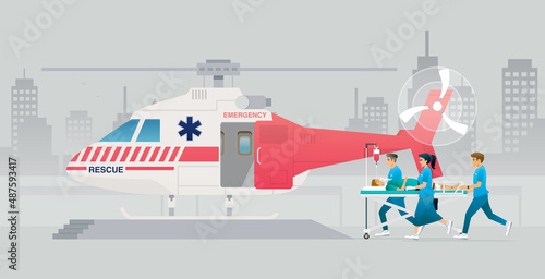 Fototapeta Medical personnel are transporting coma patients in rescue helicopters