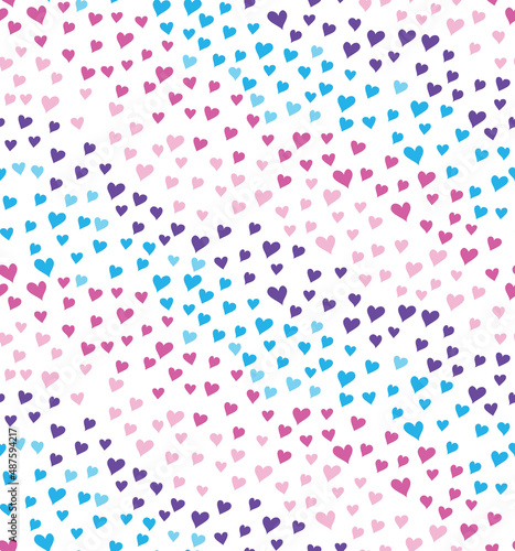 Pastel hearts in a dappled rainbow pattern flowing down diagonally. This vector patterns repeat seamlessly and is great for backgrounds and surface designs.