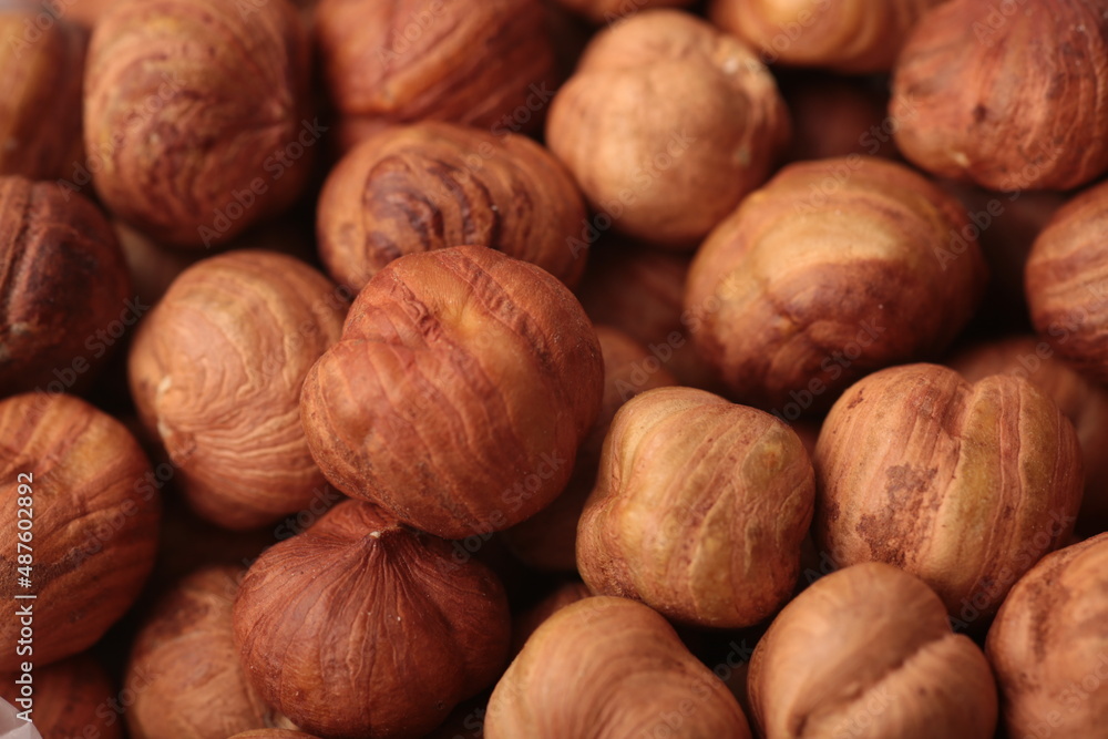 A pile of hazelnuts in close-up A pile of hazelnuts in close-up