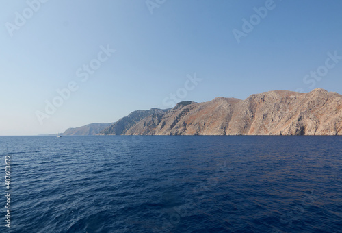Panorama of the rocky sea coast taken on a boat trip in the Mediterranean