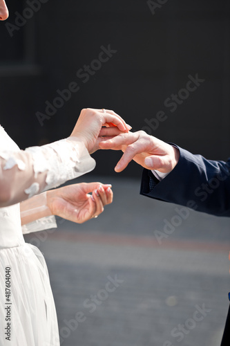 Wallpaper Mural The process of putting wedding rings on the fingers of the newlyweds 42 Torontodigital.ca