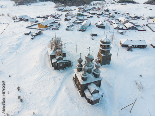 View of the wooden temples and the Pomor village Vorzogory. Russia, Arkhangelsk region  photo