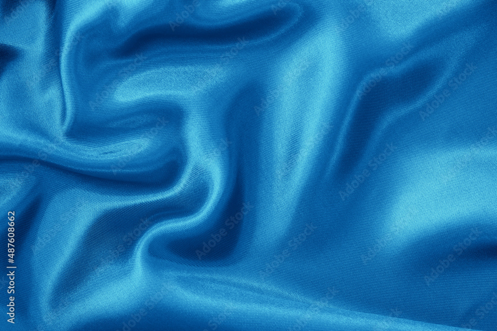 Obraz premium Blue fabric cloth texture for background and design art work, beautiful crumpled pattern of silk or linen.