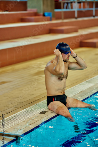 Male swimmer preparing for swimming