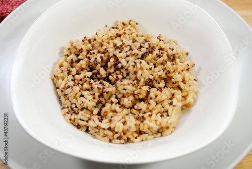 A Side Dish of Steamed Quinoa and Brown Rice in a White Bowl