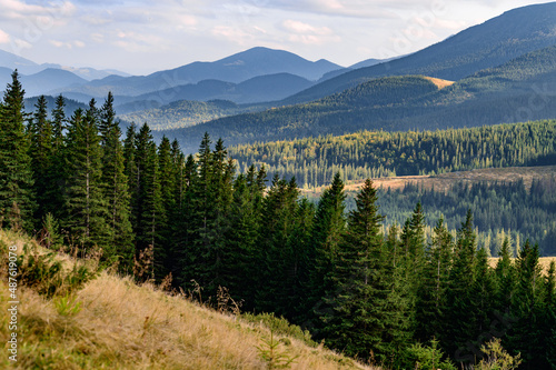 Landscapes in the mountains during autumn, hiking trails in the Carpathians, picturesque and authentic landscapes.