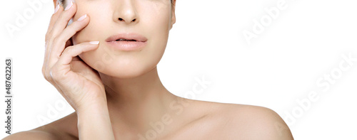 Beauty face woman with healthy fresh glowing skin. Cosmetology and facial treatment concept.