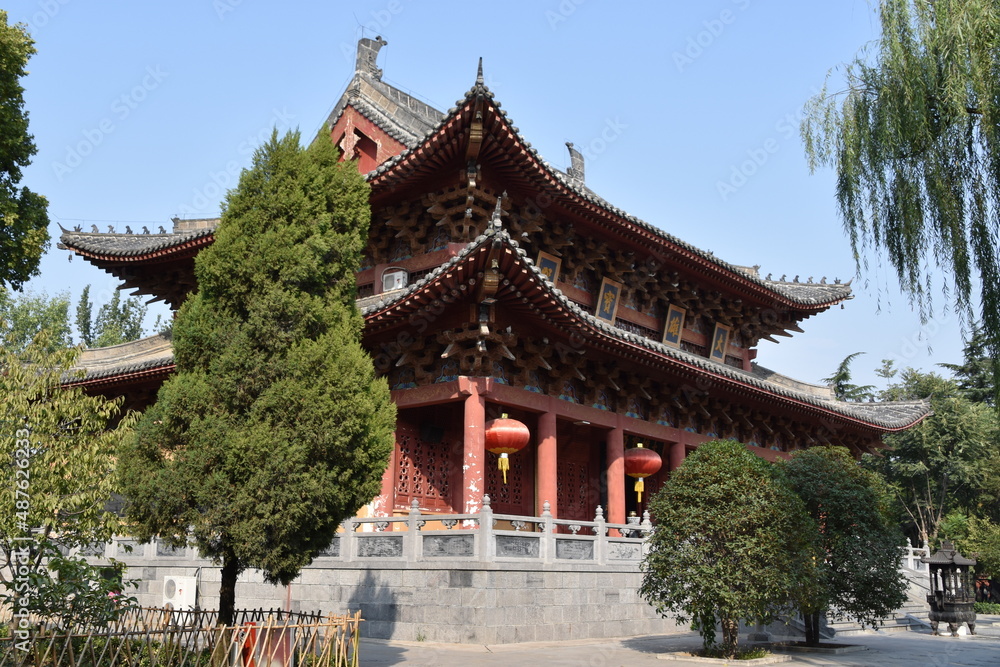 White Horse Temple, Luoyang, China. The birthplace of Chinese Buddhism. Famous red bricked walls and courtyards of a tranquil temple complex. White Horse Temple, Luoyang, China. The birthplace of Chinese Buddhism. Famous red bricked walls and courtyards of a tranquil temple complex.