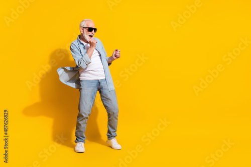 Photography Full length body size view of attractive cheerful grey-haired man having fun cop