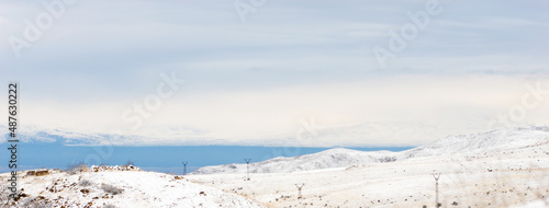 Snow covered mountain peak winter panorama landscape © Volha