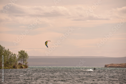 Mesmerizing view of a kite surfer on the water