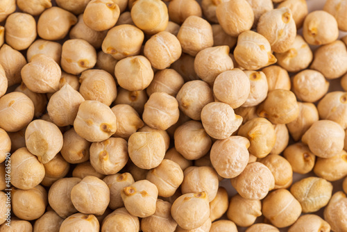 Texture of raw chickpeas. Food background with legume