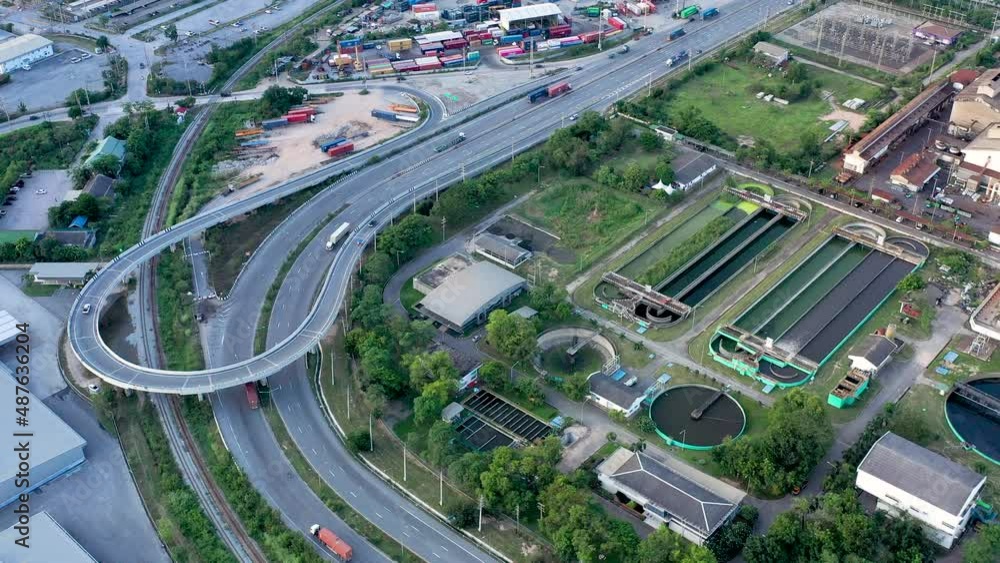 Aerial top view Transportation system,Public transport during day and the U-turn bridge Aerial top view Transportation system,Public transport during day and the U-turn bridge