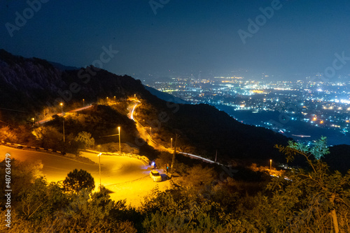 Beautiful night view of Islamabad city from margalla hills  photo