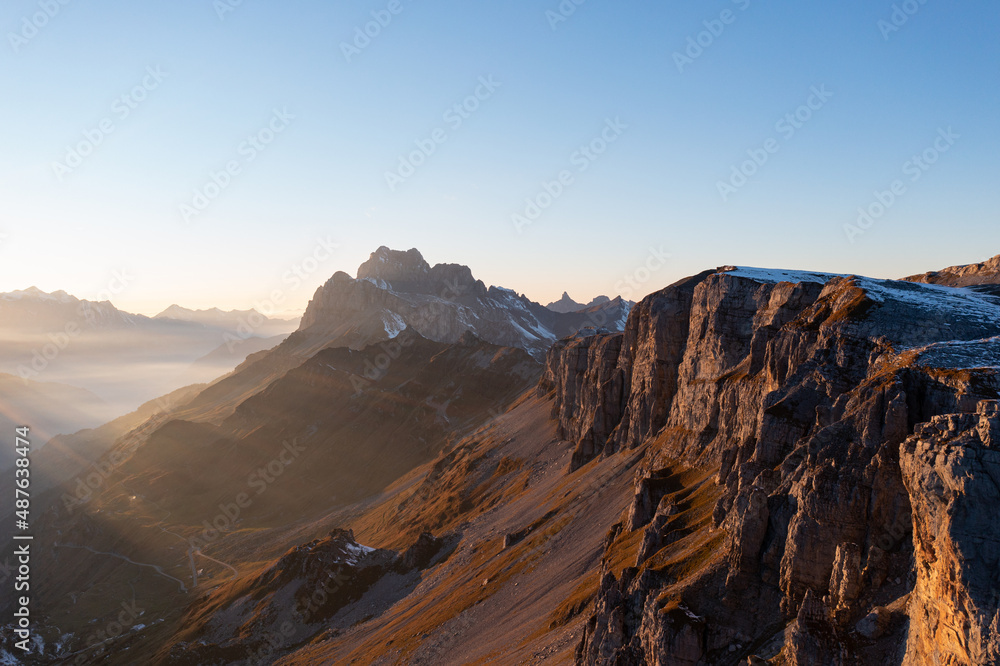 Amazing sunset in the alps of Switzerland. Wonderful flight with a drone over an amazing landscape in the canton of Uri and Glarus. Epic view over a street called Klausenpass.