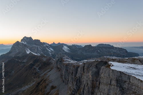 Amazing shot of a beautiful landscape in the alps of Switzerland. Wonderful flight with a drone over an amazing landscape in the canton of Glarus. Epic view at sunset.