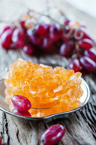 sugar crystal Navat. Stone grape sugar or crystal sugar is a traditional Asian confection. Selective focus photo