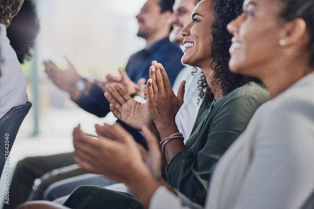 © Adene Sanchez/peopleimages.com - Acknowledging a colleagues achievement. Cropped shot of a group of businesspeople applauding during a seminar in the conference room.