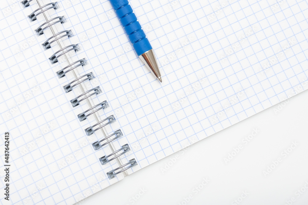 Blank empty open spiral notebook with a pen on it, study, education and planning concept, copy space Blank empty open spiral notebook with a pen on it, study, education and planning concept, copy space