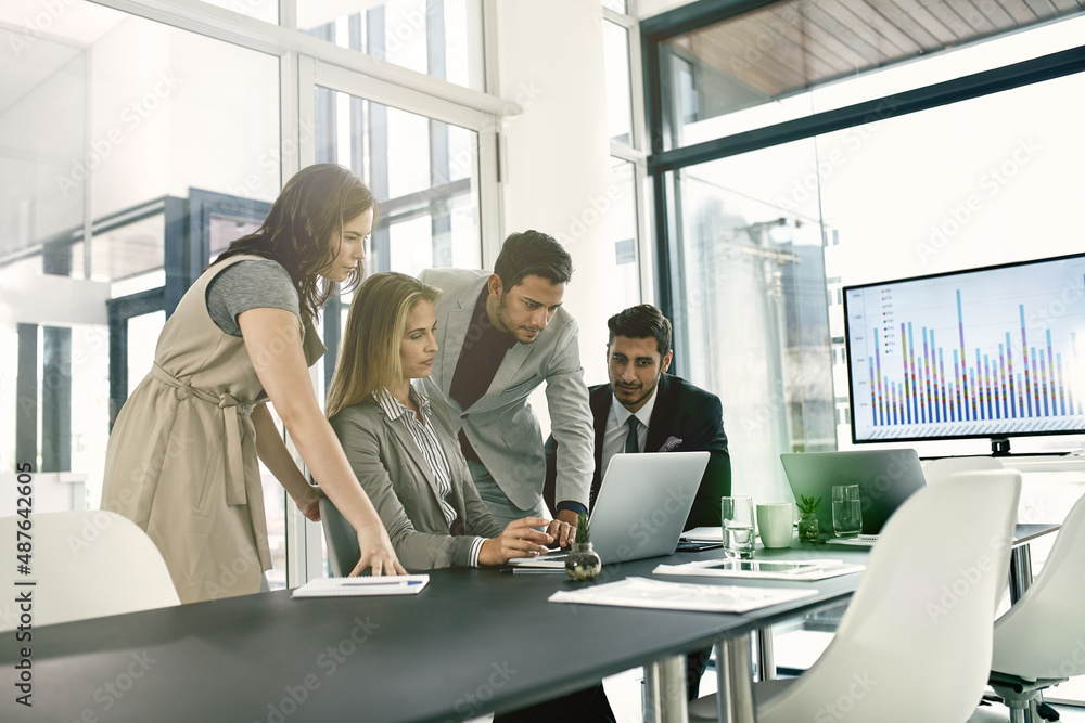 Presenting ideas to the team. Shot of corporate businesspeople meeting in the boardroom. Presenting ideas to the team. Shot of corporate businesspeople meeting in the boardroom.