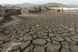 Dry soil of abandoned old village of Aceredo, Galicia, Spain. Submerged since the construction of the Alto Lindoso dam in 1992, emerged due to the current drought in this region
