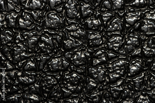 Fotografie macro texture of surface of black synthetic material
