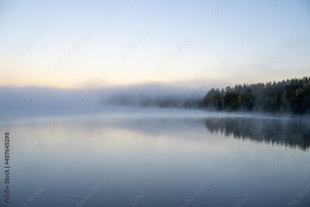 Fototapeta premium Misty morning on the lake