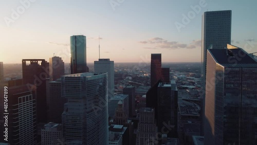 Houston, Texas - Aerial Shot, Drone Panning Left Across Cityscape During Sunset
