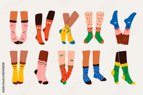 Abstract legs in socks. Hand drawn funny pairs of female male feet in trendy clothing items. Flat vector illustration