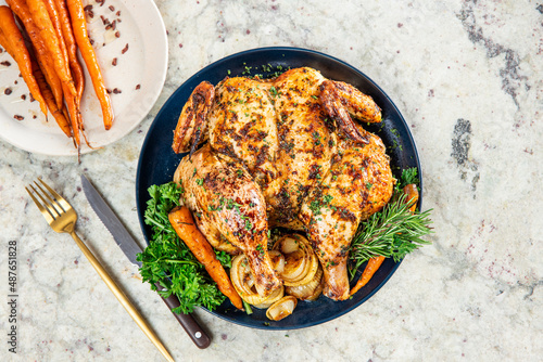 Tableau sur toile Whole Herbed Baked, Butterflied Chicken in Plate