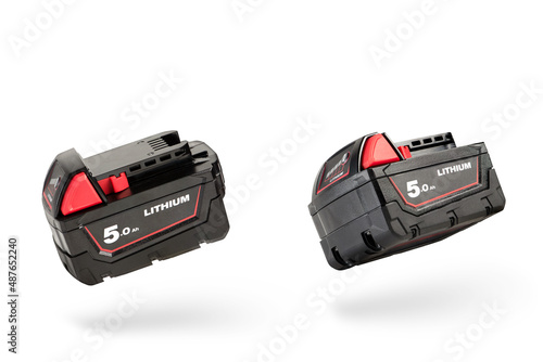 Batteries for cordless tools. Screwdriver battery. Batteries with charge indicator isolated on white background with shadow
