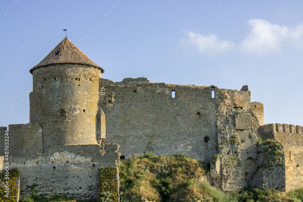 Ancient citadel fortress. Military tower fortifications. Medieval security defensive wall surrounding the old town. Archaeological excavations ruins bastion Ackerman.